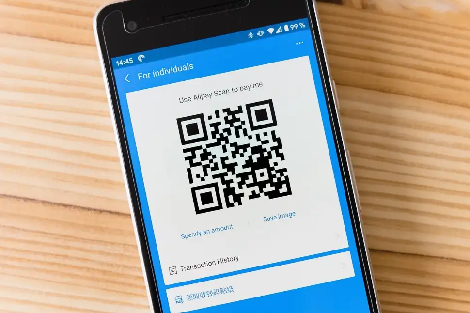 Phone displaying an Alipay QR payment code